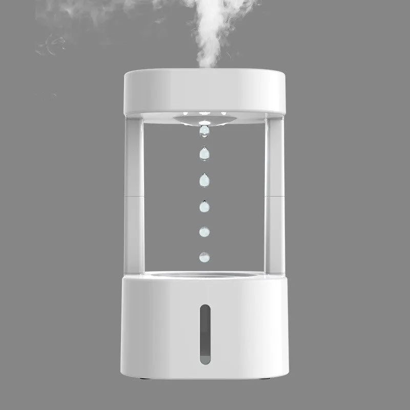 Creative anti-gravity water drop humidifier with upward flowing droplets and coloured lights