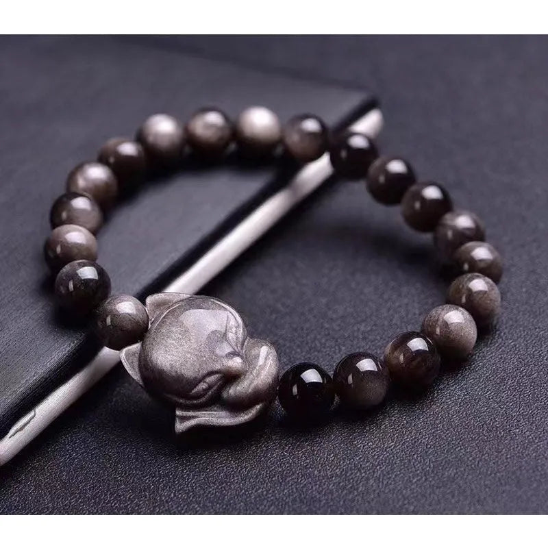 Obsidian fox bracelet with 8mm polished black stone bead and sterling silver fox charm on a bracelet chain.