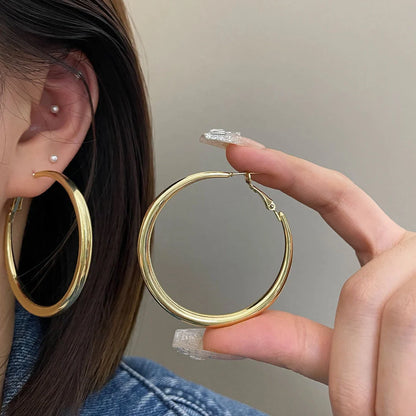 Silver pigment ring earrings with 5cm circular designs on 925 silver posts