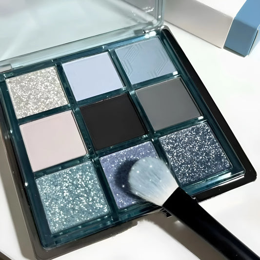 Low saturation blue smoked eye shadow palette with nine colours including matte and shimmer finishes with diamond debris textures