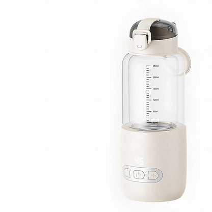 Wireless portable milk mixer with glass construction maintaining constant 37°C temperature for baby formula