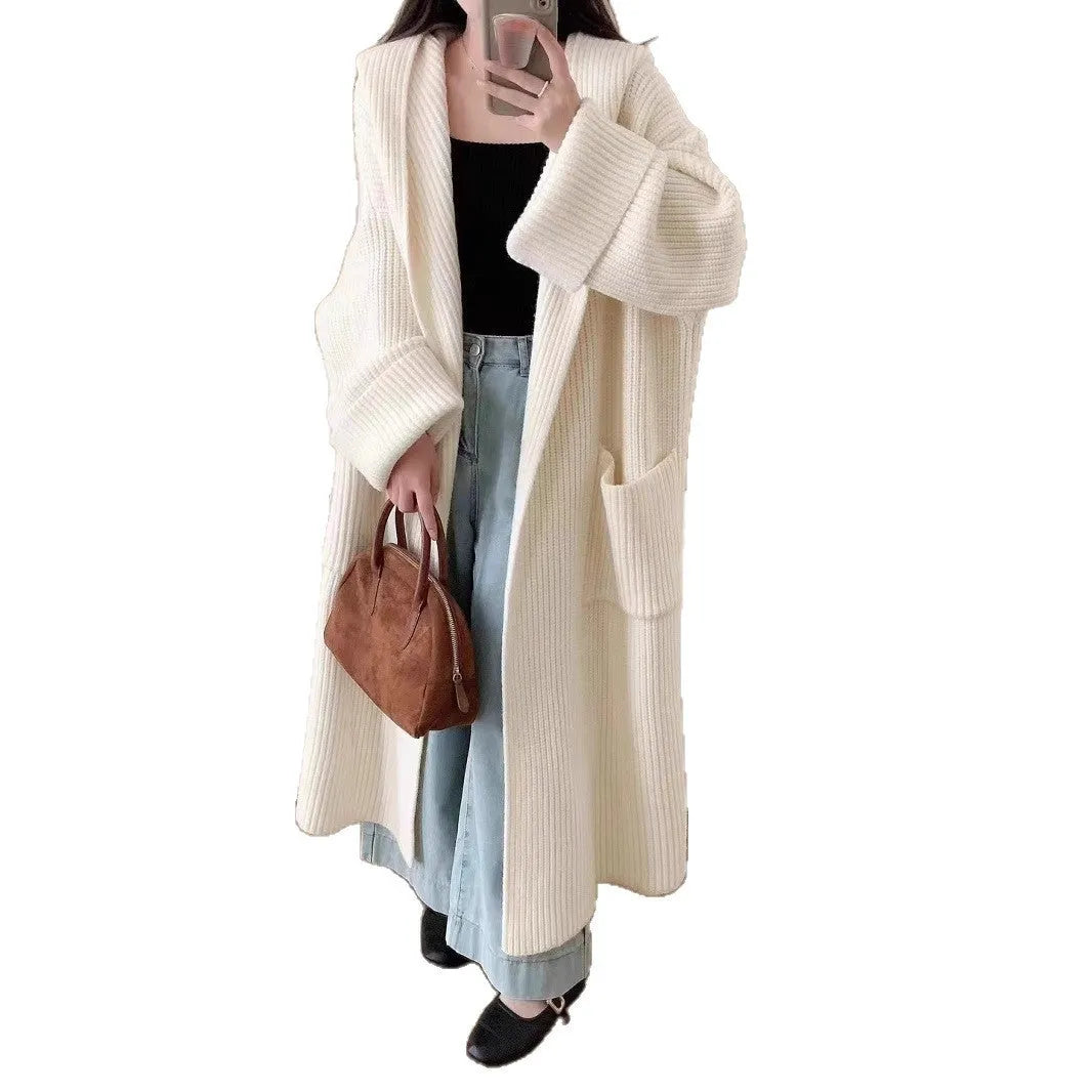 Loose hooded women's cardigan with raglan sleeves in milky white colour showing extended 80cm length