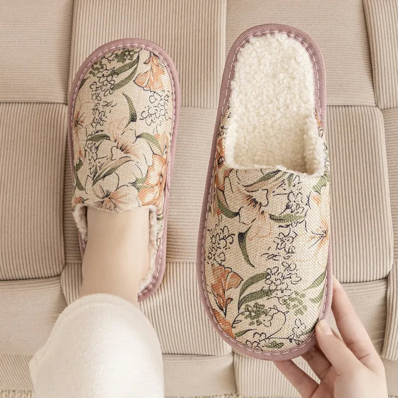 Pair of floral cotton slippers with linen-texture upper and light PVC sole for home wear.