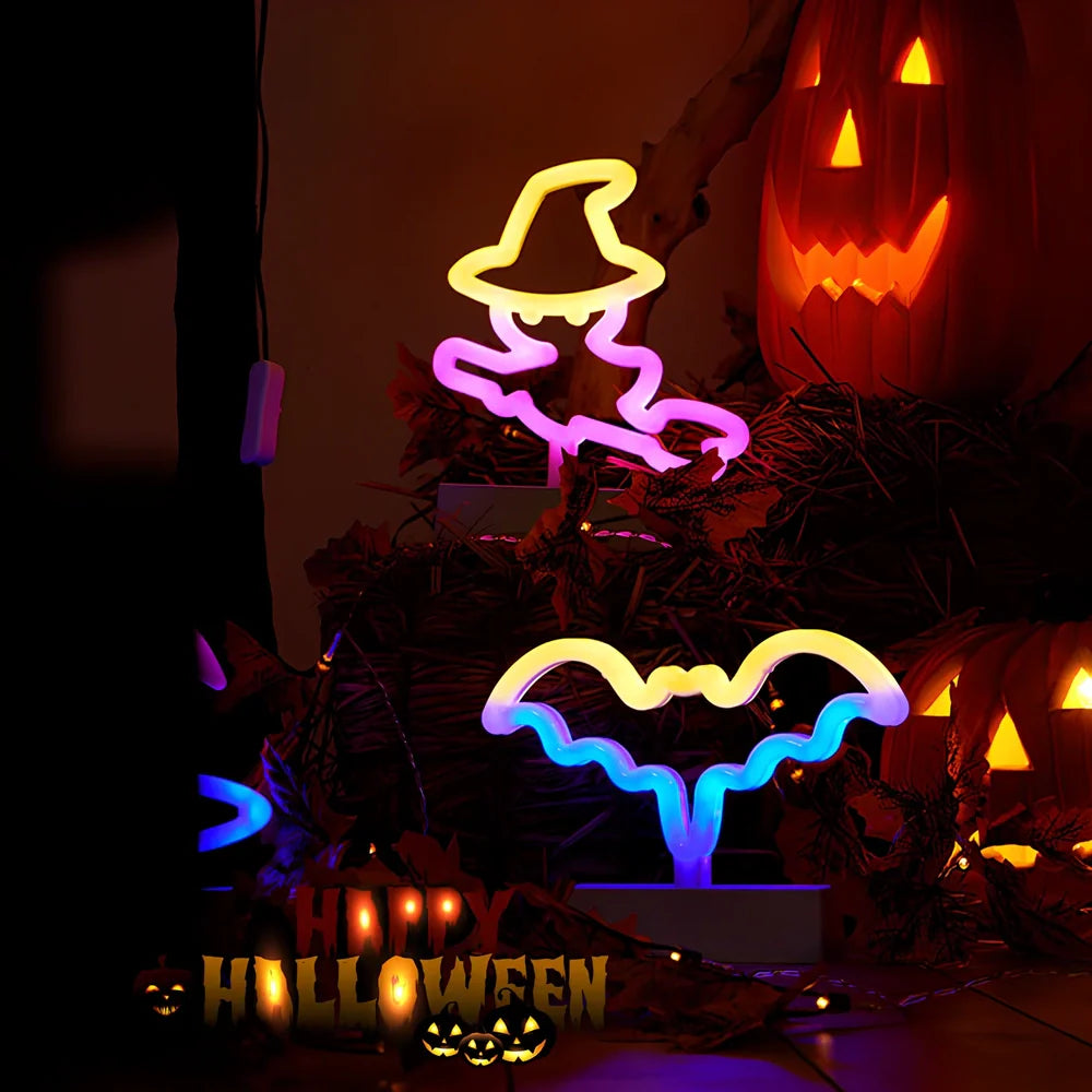 Set of nine glowing Halloween pumpkin lanterns in varying sizes from 14.5cm to 23cm height with plastic construction