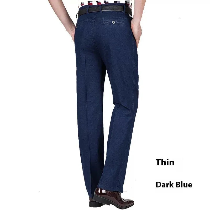 Men's high waist loose fit blue jeans on a hanger showing zip fly and casual style.