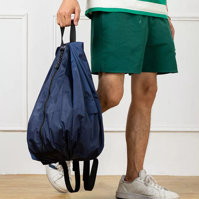 Women's waterproof foldable backpack in navy blue, perfect for outdoor and campus use