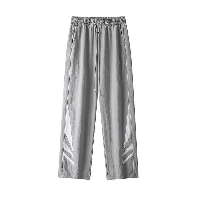 Men's black straight-leg trousers with non-iron fabric, elastic waistband, and plus sizes for summer wear