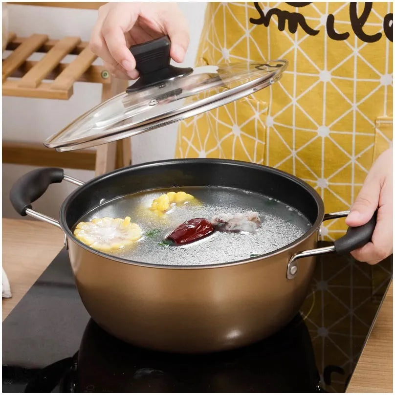 Cast iron three-piece cookware set showing a soup pot, milk pot, and wok with non-stick coating.