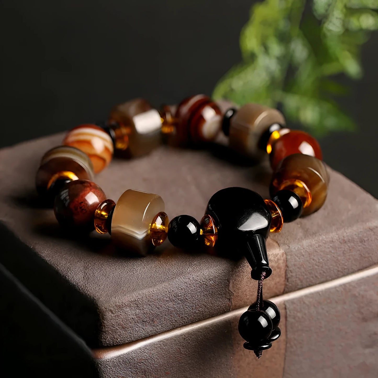 Natural agate ethnic bracelet with geometric design featuring multiple agate bead types and sizes