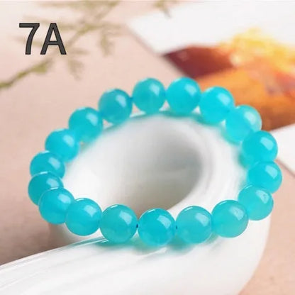 Natural blue-green Amazonite scattered beads in various sizes from 6mm to 13mm diameter for jewellery making