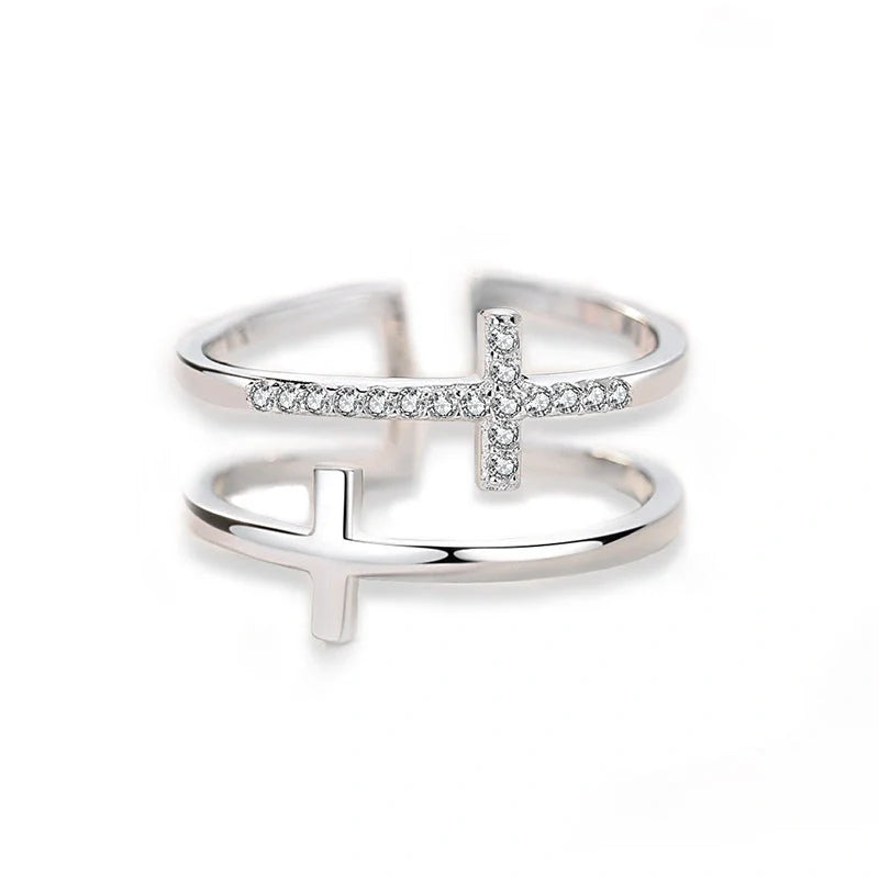 Adjustable double cross copper ring with zircon inlays, showcasing geometric design and elegant white gold color.