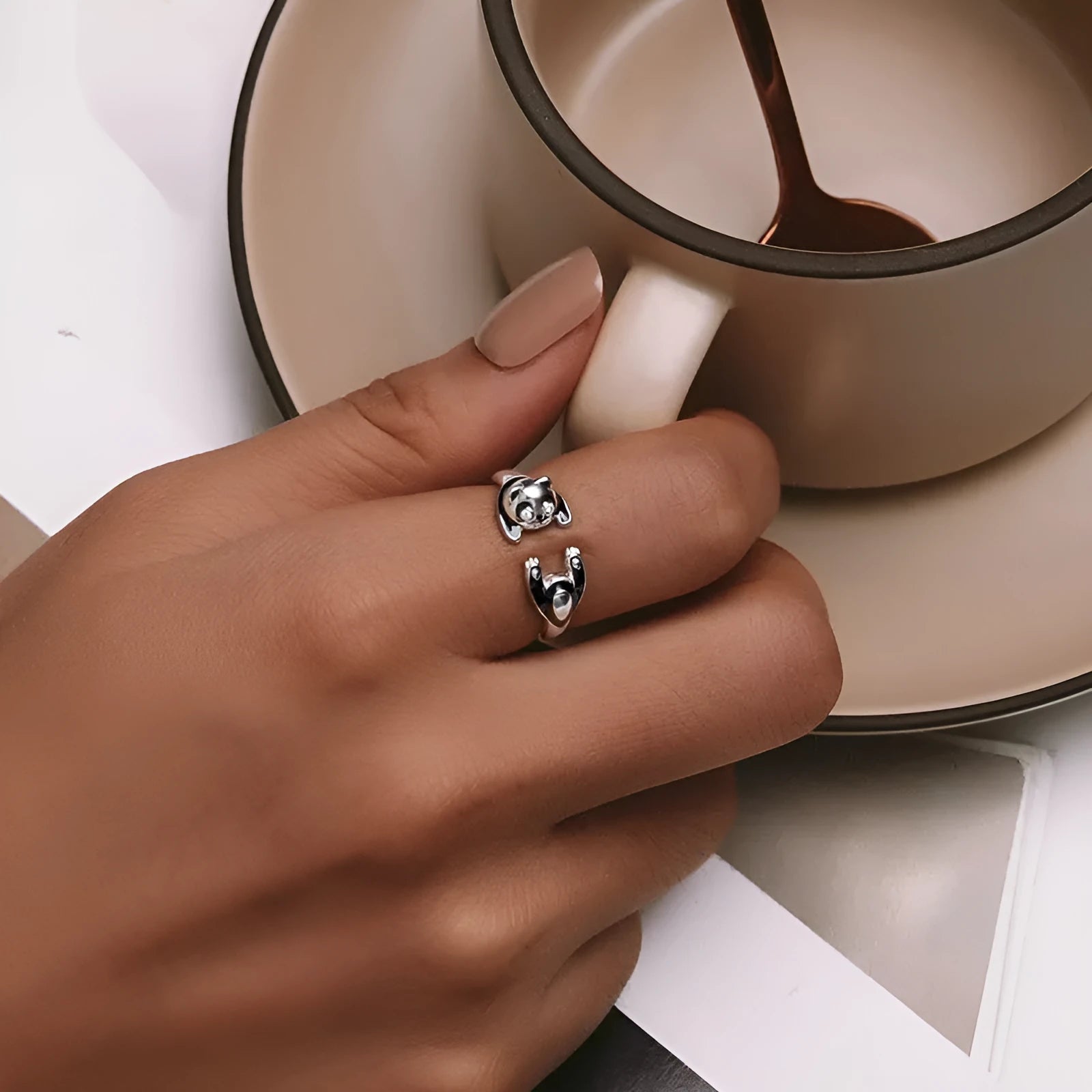 Adjustable panda open ring bracelet in sterling silver with white gold plating, showing animal modelling details and open design