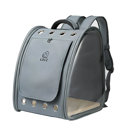 Blue pet backpack with transparent PVC windows showing interior, adjustable shoulder straps, and ventilation holes