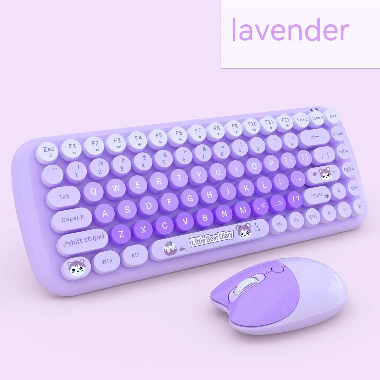 Pink mini wireless keyboard and mouse set with cute cartoon design on desk