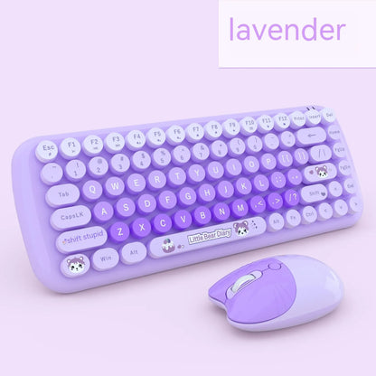 Pink mini wireless keyboard and mouse set with cute cartoon design on desk