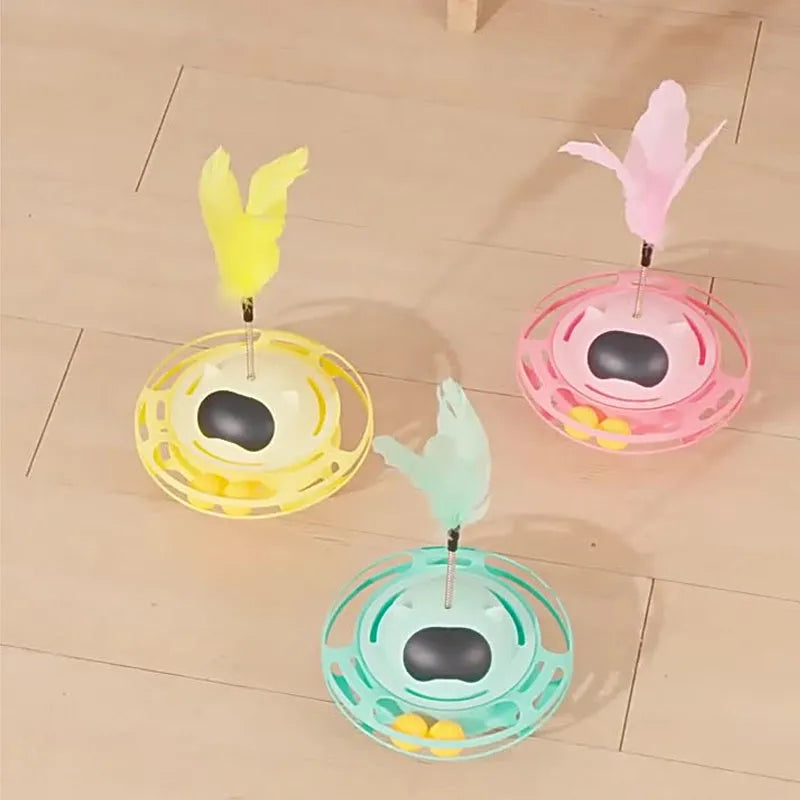 Pink cat tumbler turntable toy for self-play, measuring 17cm by 10cm.