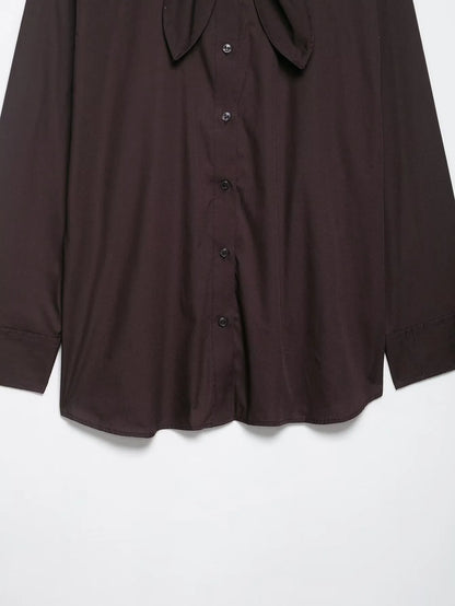 Brown women's loose fit poplin shirt with cardigan-style opening and bow tie detail