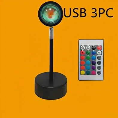 Rainbow sunset projector lamp with remote control showing colourful wall lighting effects