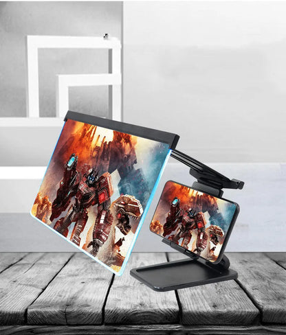 Black mobile phone screen amplifier with detachable holder, magnifying to 12 inches, folded for portability