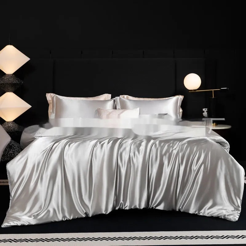 Household Fashion 100% silk bed sheet four-piece set in seven colour options showing fitted sheet, flat sheet and pillowcases