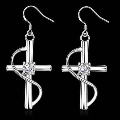 Elongated cross earrings in white metal, versatile and durable design