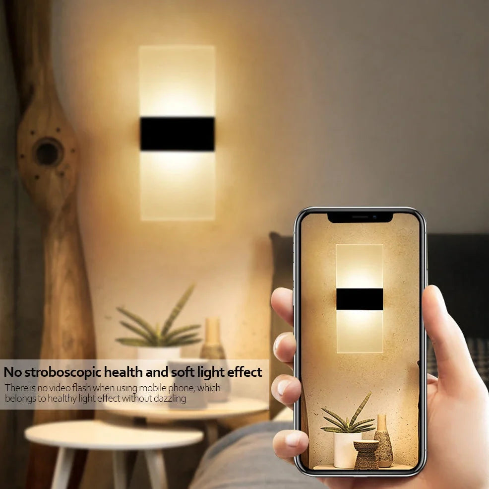 Black right-angle motion-sensing wall lamp with USB charging port and acrylic shade