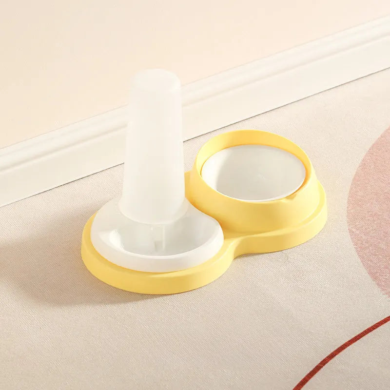 Grey and yellow double pet feeding bowl with raised neck protection and non-slip base.