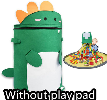Green felt storage cube with pull rope unfolded into a large square play mat on a wooden floor.