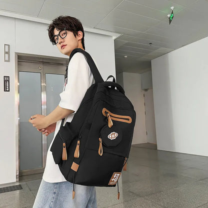 Large waterproof nylon travel backpack in blue with contrast stitching and 20-35 litre capacity