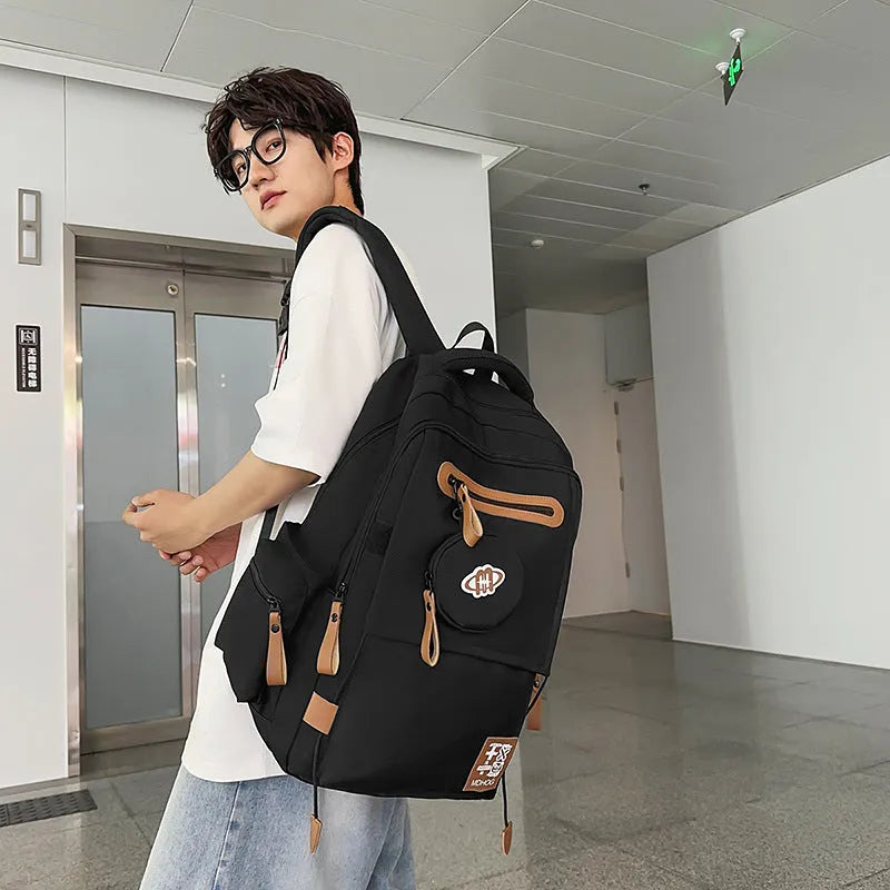 Large capacity travel backpack in waterproof nylon material with 20-35 litre capacity, suitable for leisure travel and daily commuting, featuring contrast stitching details and available in black, creamy-white, red, khaki, and blue colour options.