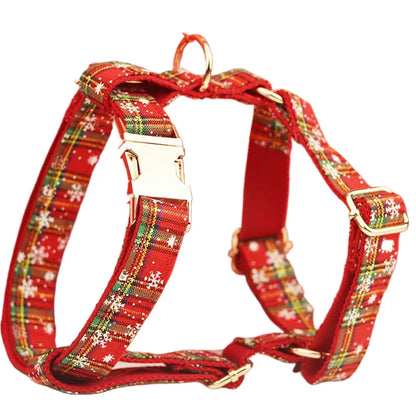 Red snowflake plaid Christmas dog collar and leash set with matching floral vest and bow accessory
