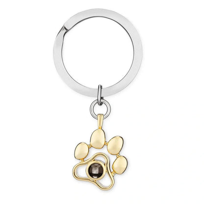 Custom dog paw projection necklace in silver with adjustable chain