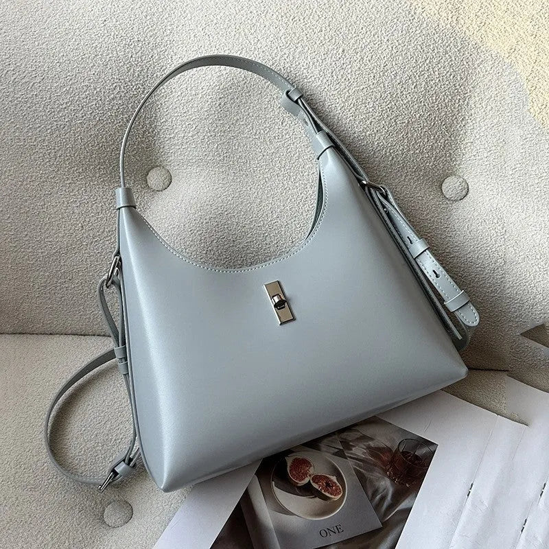 Genuine leather dumpling-shaped crossbody shoulder bag in six colour options showing sandwich pocket and internal organisation