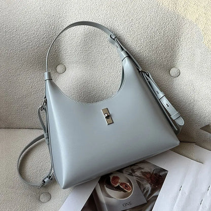 Genuine leather dumpling-shaped crossbody shoulder bag in six colour options showing sandwich pocket and internal organisation