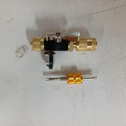 Vacuum valve core disassembly tool set with black and pink valve removers and wrench for tyre maintenance
