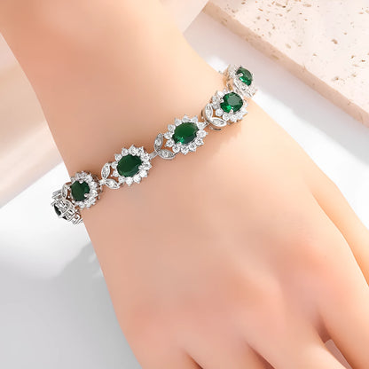 Personality Trend adjustable alloy bracelet with inlaid zircon stones in a choice of nine gemstone colours on a wrist.