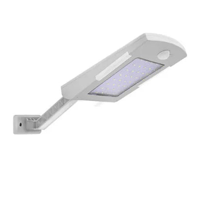 Solar-powered outdoor garden light with motion sensor in black or white with wall mount or pole options