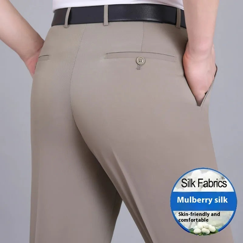 Men's dark blue high-waisted straight-leg non-ironing trousers made from a silk blend fabric.