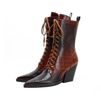Dark brown women's ankle boots with a chunky heel, pointed toe, side zipper, and a retro stone pattern on the microfiber upper.