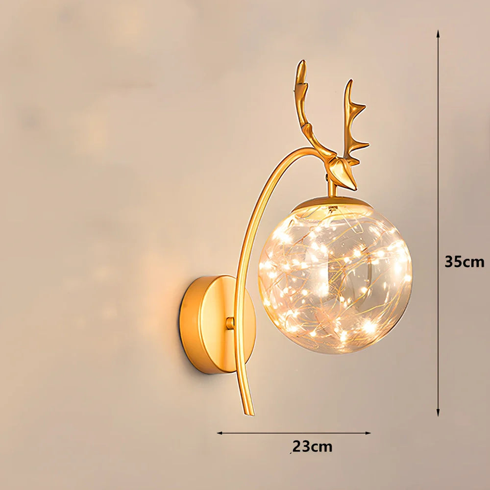 Crystal bedside lamp with stainless steel base and transparent shade providing soft illumination