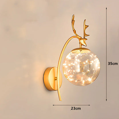 Crystal bedside lamp with stainless steel base and transparent shade providing soft illumination