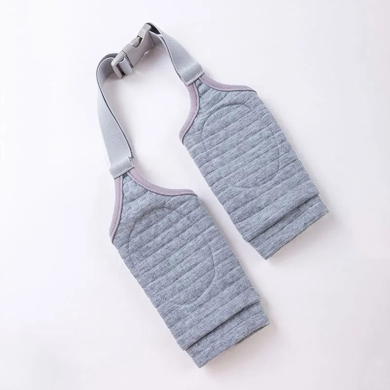 Blue dog knee protector sleeve with elbow padding and scarf on a medium-sized dog