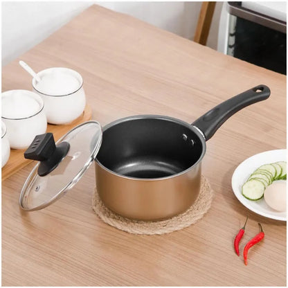 Cast iron three-piece cookware set showing a soup pot, milk pot, and wok with non-stick coating.
