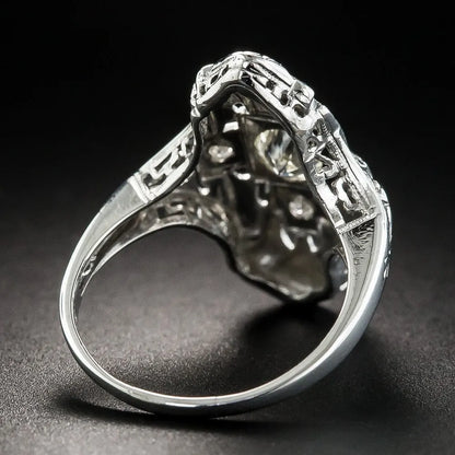 Hollow geometric ring with diamond-studded design in electroplated silver finish