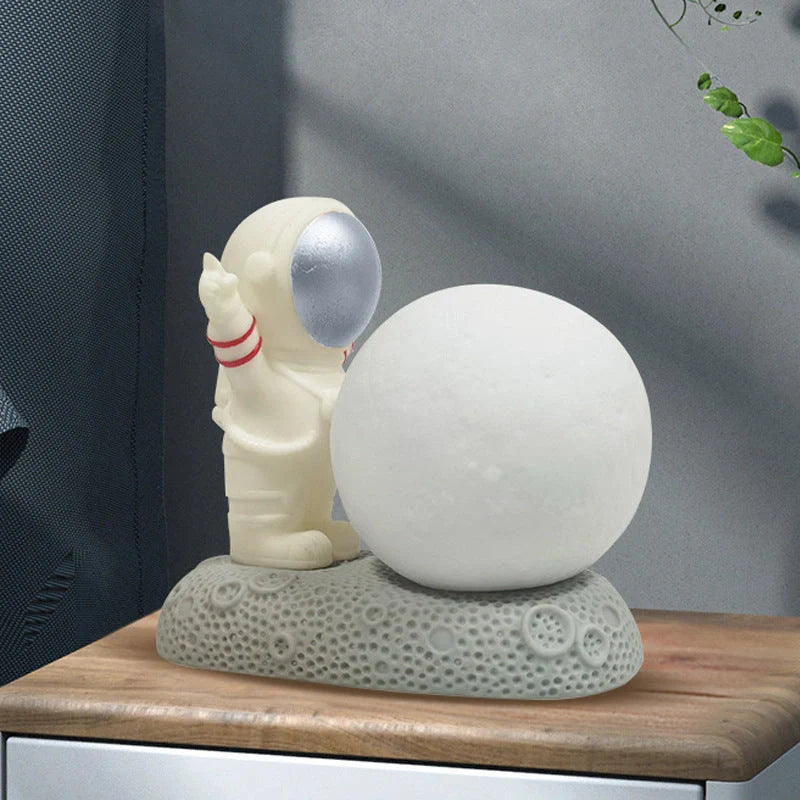 Modern astronaut night lamp with color-changing LED and detachable design