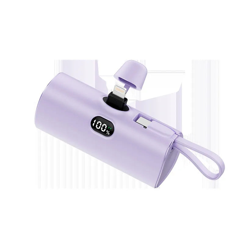 Capsule digital display wireless power bank showing battery percentage on screen, compact 79x34x26mm design with integrated plug