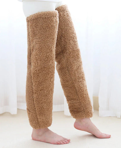 Cozy over-the-knee fuzzy socks in various colors, including brown, blue, dark gray, pink, silver, and more. Comfortable cotton design for warm, snug legs.