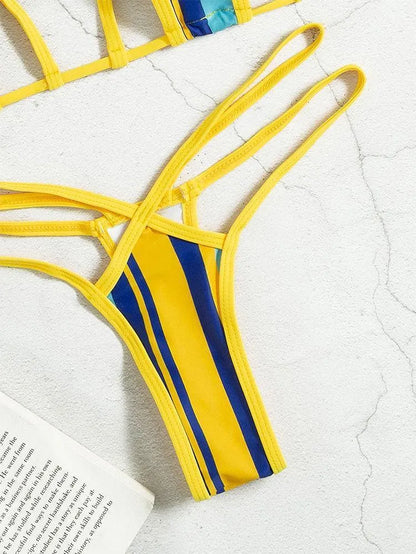 Yellow high-waist backless split swimsuit for women with neck-hanging hollow suit design.