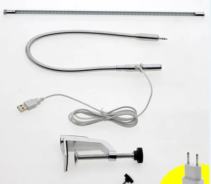 Silver aluminium alloy LED nail lighting table lamp with long arm and clip mounting for beauty workstations