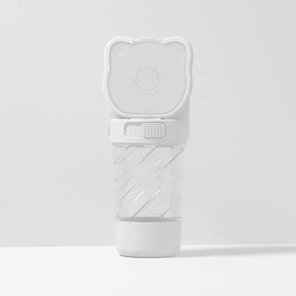 Green 3-in-1 pet water bottle showing water dispenser, food container, and waste bag compartment